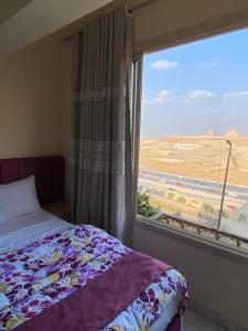 Postel nebo postele na pokoji v ubytování Pyramita Hotel + 37 fotografií