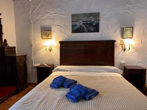Łóżko lub łóżka w pokoju w obiekcie Casa Rural Navalonguilla con piscina