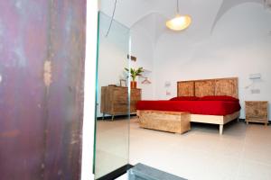 Voodi või voodid majutusasutuse Secret Suite Varigotti toas