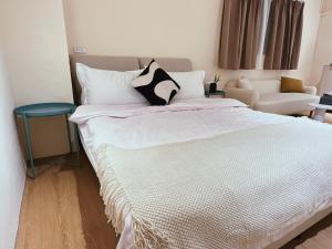 Letto o letti in una camera di Homiday