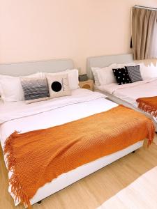 Letto o letti in una camera di Homiday