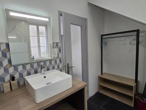 Kúpeľňa v ubytovaní Appartement au calme idéalement placé à Mâcon.