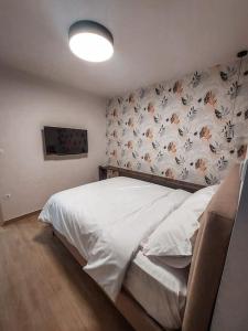 Voodi või voodid majutusasutuse Iris Apartment Livadeia toas