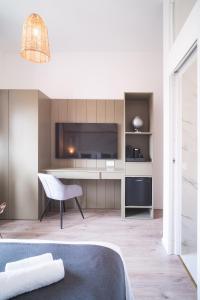 Kuchyň nebo kuchyňský kout v ubytování New Elegance Suites Guesthouse