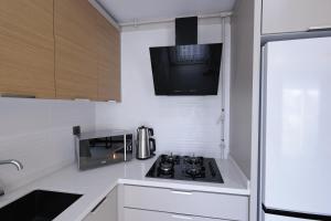 Kuchyň nebo kuchyňský kout v ubytování Livia Residence