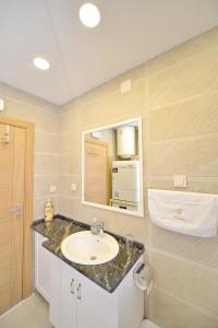 Koupelna v ubytování Apartments PROVA + 37 fotografií