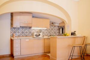 Η κουζίνα ή μικρή κουζίνα στο Casa Giulia - sophisticated apartment with view