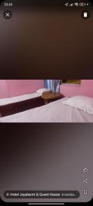 Postel nebo postele na pokoji v ubytování Jayalaxmi guest House