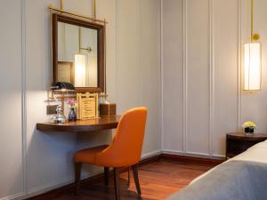 Voodi või voodid majutusasutuse Minerva Premium Hotel toas