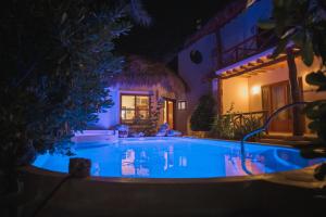 Bazén v ubytování Casa Iguana Holbox - Beachfront Hotel nebo v jeho okolí
