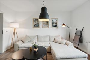 Postel nebo postele na pokoji v ubytování Stylisches Apartment, 2-5 Personen, Zentral, Nähe Messe