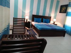 Voodi või voodid majutusasutuse Nilambara Lake View toas