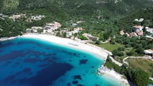 an aerial view of a beach with blue water at Sissy Villas 2 in Poros