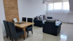 Posezení v ubytování S-Apartmani Cocetova