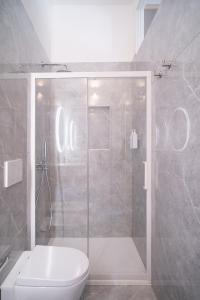 Koupelna v ubytování New Elegance Suites Guesthouse