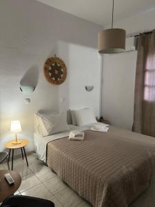 Postel nebo postele na pokoji v ubytování Fedra Apartments Lindos