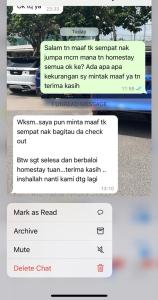 a screenshot of a text message about a car at NR Guest House in Kangar