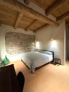 Giường trong phòng chung tại San Nicola Ospitalità Diffusa