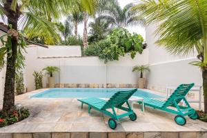 Bazén v ubytování Casa com piscina em Piratininga nebo v jeho okolí