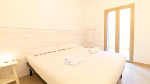 Ένα ή περισσότερα κρεβάτια σε δωμάτιο στο Funtan'House