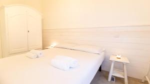 Ένα ή περισσότερα κρεβάτια σε δωμάτιο στο Funtan'House