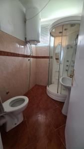 Koupelna v ubytování Apartment Zvezdara