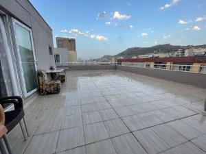 an empty balcony with a view of a building at Lux Apartment+Terrace in Mardin