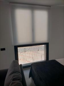 Posteľ alebo postele v izbe v ubytovaní Terraza del Bajondillo Torremolinos