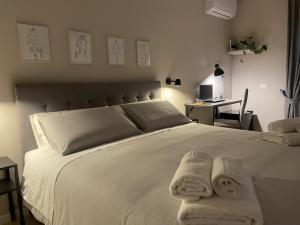 Letto o letti in una camera di Casa Karina
