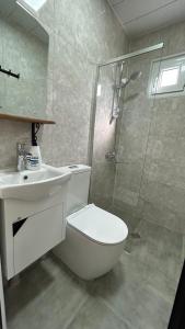 Koupelna v ubytování Ludwig Guesthouse