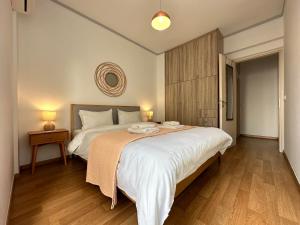Ένα ή περισσότερα κρεβάτια σε δωμάτιο στο A7 Luxury Boutique Apartment in Thiseio