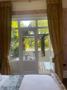Cama ou camas em um quarto em Penarwyn House
