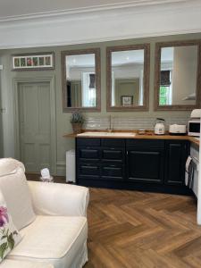 A cozinha ou cozinha compacta de Penarwyn House