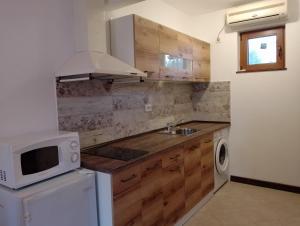 A kitchen or kitchenette at Pearl Apartments Sozopol