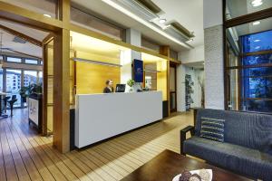 a lobby with a reception desk in a building at Picton Yacht Club Hotel in Picton