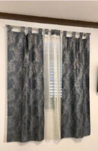 een gordijn in een raam in een kamer bij Room Blue Moon Split in Split