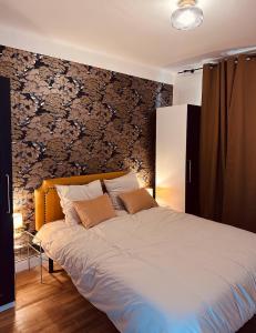 Giường trong phòng chung tại L Appartement - Siam vue Capucins