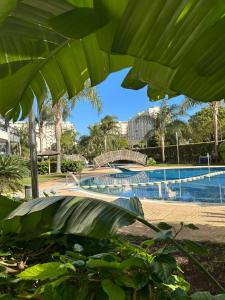 vista para uma piscina num resort em MARGO EL EDEN Residencial em Gandia