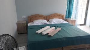 Postel nebo postele na pokoji v ubytování Hotel Marinus