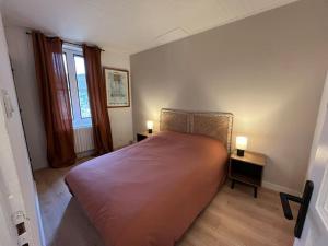 Ένα ή περισσότερα κρεβάτια σε δωμάτιο στο Maison Mirabeau