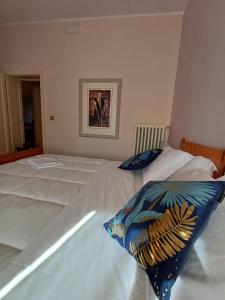 A bed or beds in a room at Alloggio Taddei