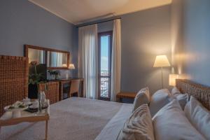 Postel nebo postele na pokoji v ubytování Hotel Cetarium + 37 fotografií