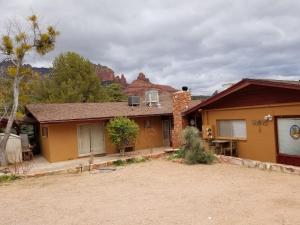 a house with a mountain in the background at Redrockescapes in Sedona