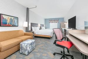 TV a/nebo společenská místnost v ubytování Home2 Suites By Hilton Huntsville, Tx