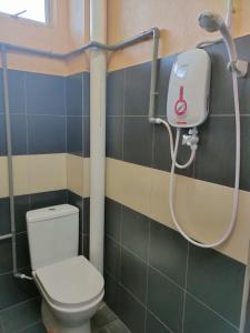 Een badkamer bij HOTEL RS INN