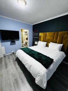Ένα ή περισσότερα κρεβάτια σε δωμάτιο στο Blue Lily Haven Cape Town Self Catering Home