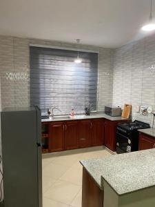 Kuchyň nebo kuchyňský kout v ubytování maasaifari Cozy 2