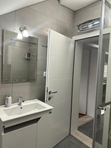 Vonios kambarys apgyvendinimo įstaigoje Apartment Holiday