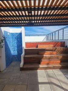 a set of stairs with a view of the ocean at DEPARTAMENTO JARDIN in Santiago del Estero