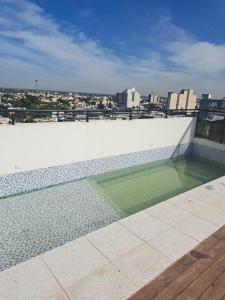a swimming pool on the roof of a building at DEPARTAMENTO JARDIN in Santiago del Estero